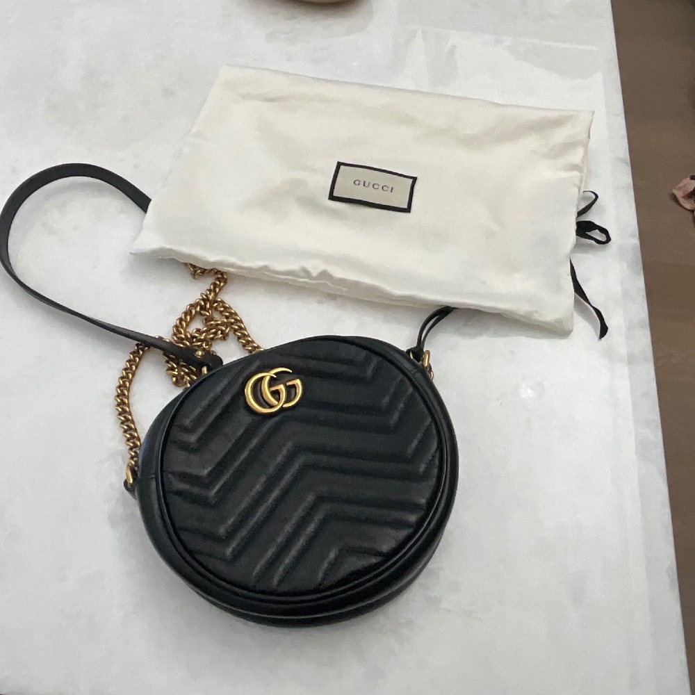 Guicci  Round Crossbody Bag with Gold Trim ……Like New!
